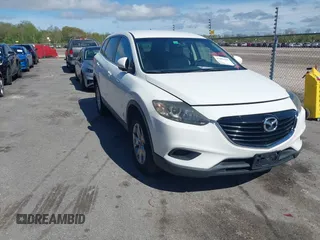 2015 Mazda CX-9 Sport with VIN JM3TB2BV3F0455632, listed as a IAAI auction lot 41881026 with 102,201 mi miles and . Bid and sale history available at carsss.com. Image 1.
