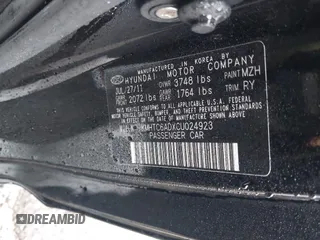2012 Hyundai Veloster w/Black Int with VIN KMHTC6ADXCU024923, listed as a IAAI auction lot 41556793 with 101,923 mi miles and . Bid and sale history available at DreamBid. Image 9.