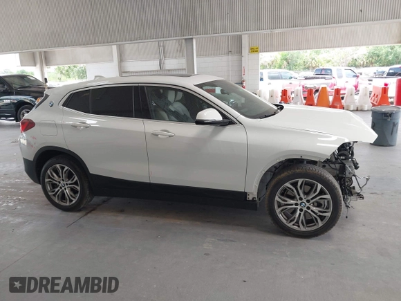 2022 BMW X2 sDrive28i z VIN WBXYH9C08N5U29086, wystawiony jako IAAI lot #42119627 z przebiegiem 76 364 mil mil oraz . Historia ofert i sprzedaży dostępna na DreamBid. Obrazek 14.