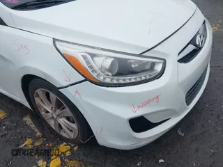 2014 Hyundai Accent SE with VIN KMHCU5AE8EU145629, listed as a IAAI auction lot 41497848 with 134,919 mi miles. Bid and sale history available at carsss.com. Image 14.