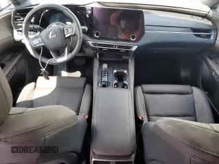 2023 Lexus RX with VIN 2T2BAMBA3PC001898, listed as a Copart auction lot 74104154 with 6,702 mi miles and Salvage Title. Bid and sale history available at carsss.com. Image 8.