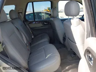 2006 GMC Envoy Denali with VIN 1GKET63M762312848, listed as a IAAI auction lot 41764304 with 115,854 mi miles. Bid and sale history available at carsss.com. Image 8.