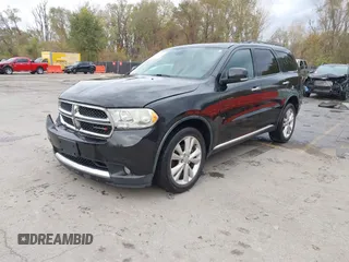 2013 Dodge Durango Crew with VIN 1C4RDHDG8DC592706, listed as a IAAI auction lot 40745114 with 95,757 mi miles and . Bid and sale history available at DreamBid. Image 2.