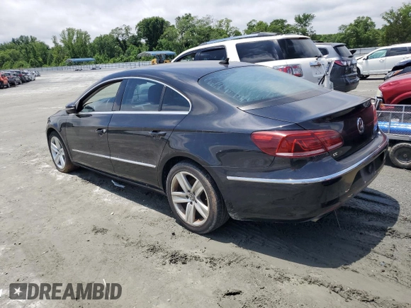 2013 Volkswagen CC Sport z VIN WVWBP7AN4DE551824, wystawiony jako Copart lot #58499425 z przebiegiem 121 809 mil mil oraz Tytuł czysty. Historia ofert i sprzedaży dostępna na DreamBid. Obrazek 2.