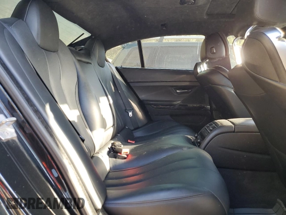 2014 BMW 6 Series 650i xDrive z VIN WBA6B4C54ED371520, wystawiony jako Copart lot #75107784 z przebiegiem 136 077 mil mil oraz Szkoda całkowita • Salvage title. Historia ofert i sprzedaży dostępna na DreamBid. Obrazek 10.