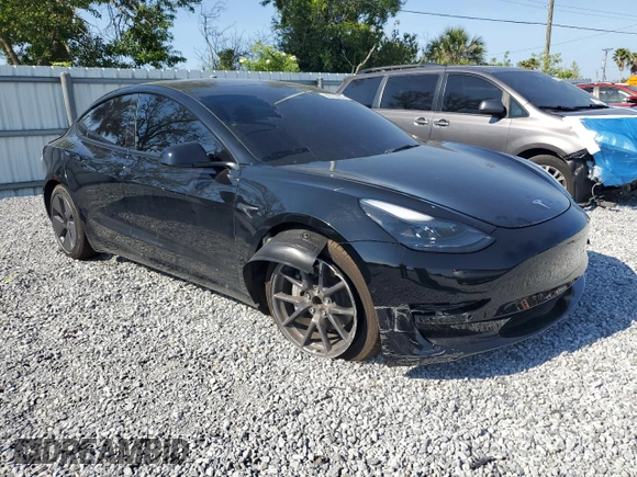 2022 Tesla Model 3 with VIN 5YJ3E1EA1NF374390, listed as a Copart auction lot 52709455 with 44,212 mi miles and Non Repairable. Bid and sale history available at carsss.com. Image 4.