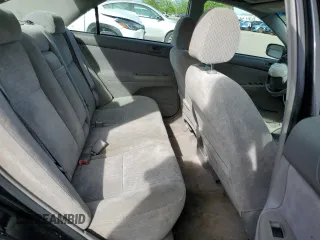 2002 Toyota Camry XLE z VIN 4T1BF32K02U034535, wystawiony jako Copart lot #53894995 z przebiegiem 253 037 mil mil oraz Szkoda całkowita • Salvage title. Historia ofert i sprzedaży dostępna na DreamBid. Obrazek 10.