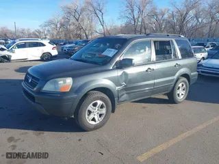 2005 Honda Pilot EX-L with NAVI with VIN 2HKYF18775H553666, listed as a IAAI auction lot 41858179 with 241,011 mi miles. Bid and sale history available at carsss.com. Image 2.