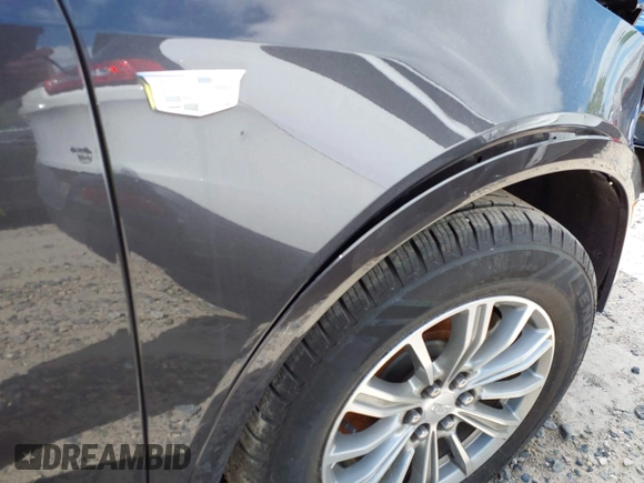 2017 Cadillac XT5 Luxury AWD z VIN 1GYKNDRS5HZ319787, wystawiony jako IAAI lot #40819077 z przebiegiem 83 510 mil mil oraz . Historia ofert i sprzedaży dostępna na DreamBid. Obrazek 19.