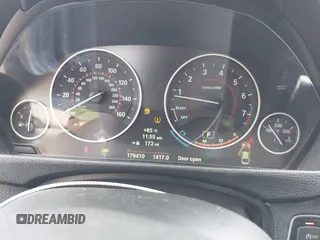 2014 BMW 4 Series 428i with VIN WBA3N7C58EF719495, listed as a IAAI auction lot 42490625 with 179,410 mi miles and . Bid and sale history available at DreamBid. Image 7.