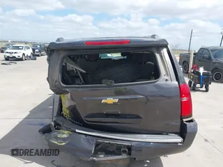 2015 Chevrolet Suburban LTZ with VIN 1GNSCKKC9FR500933, listed as a IAAI auction lot 41830980 with 169,217 mi miles and . Bid and sale history available at DreamBid. Image 15.