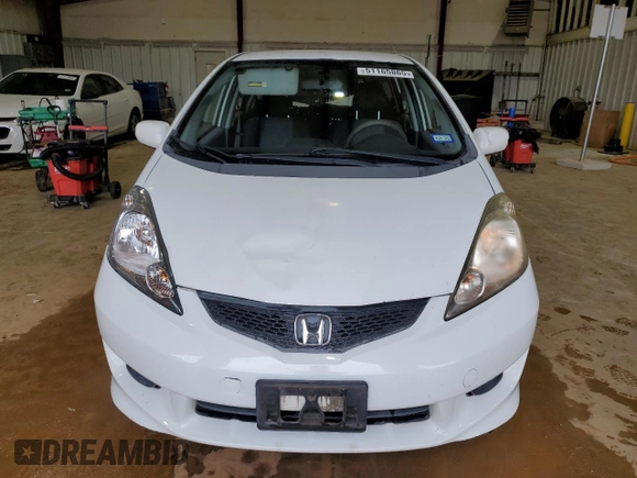 2009 Honda Fit Sport with VIN JHMGE88419S026712, listed as a Copart auction lot 51165865 with 54,586 mi miles and Salvage Title. Bid and sale history available at carsss.com. Image 5.