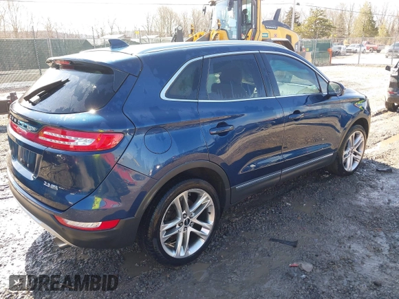 2015 Lincoln MKC with VIN 5LMTJ2AH2FUJ12531, listed as a IAAI auction lot 41639903 with 112,835 mi miles. Bid and sale history available at carsss.com. Image 4.