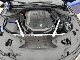 2023 BMW 8 Series 840i with VIN WBAGV2C01PCK32930, listed as a Copart auction lot 82891334 with 0 mi miles and Salvage Title. Bid and sale history available at carsss.com. Image 11.