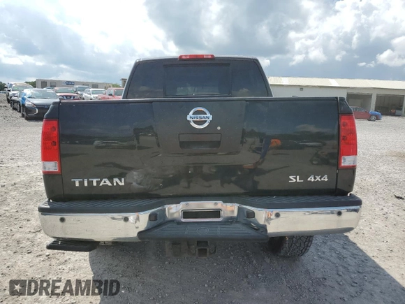 2011 Nissan Titan SL z VIN 1N6AA0EC8BN312137, wystawiony jako Copart lot #60227105 z przebiegiem 194 973 mil mil oraz Szkoda całkowita • Salvage title. Historia ofert i sprzedaży dostępna na DreamBid. Obrazek 6.