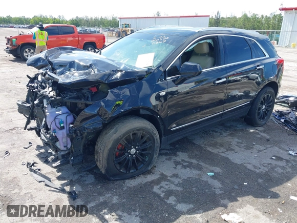 2018 Cadillac XT5 FWD with VIN 1GYKNARS2JZ160862, listed as a IAAI auction lot 42584234 with 152,785 mi miles and . Bid and sale history available at DreamBid. Image 18.