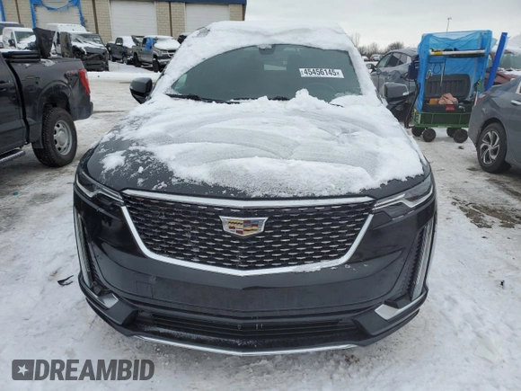 2021 Cadillac XT6 Premium Luxury with VIN 1GYKPDRS3MZ165049, listed as a Copart auction lot 45456145 with 57,112 mi miles and Salvage title. Bid and sale history available at DreamBid. Image 5.