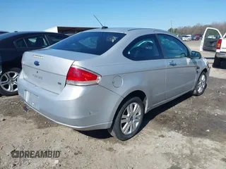 2008 Ford Focus SE with VIN 1FAHP33N48W114038, listed as a IAAI auction lot 41533744 with 143,065 mi miles. Bid and sale history available at carsss.com. Image 4.