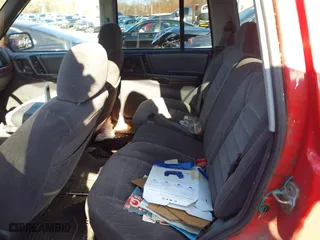 1997 Jeep Grand Cherokee Laredo with VIN 1J4GZ58S0VC550242, listed as a IAAI auction lot 41032114 with 185,307 mi miles. Bid and sale history available at carsss.com. Image 8.