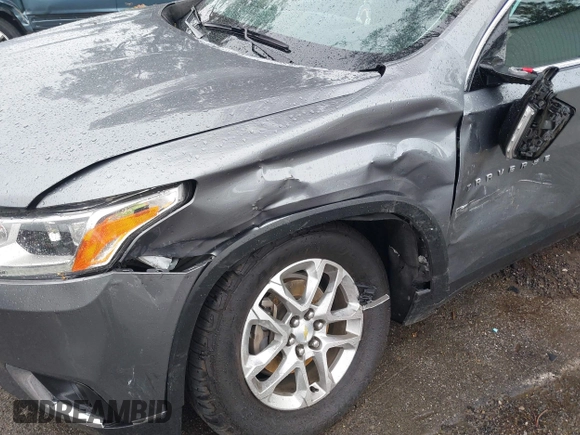 2018 Chevrolet Traverse LT Cloth with VIN 1GNERGKW8JJ220611, listed as a IAAI auction lot 41792976 with 71,705 mi miles. Bid and sale history available at carsss.com. Image 6.