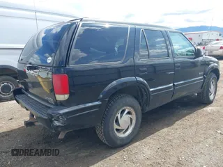 1997 Oldsmobile Bravada z VIN 1GHDT13W3V2707243, wystawiony jako IAAI lot #42024114 z przebiegiem 185 219 mil mil oraz . Historia ofert i sprzedaży dostępna na DreamBid. Obrazek 4.