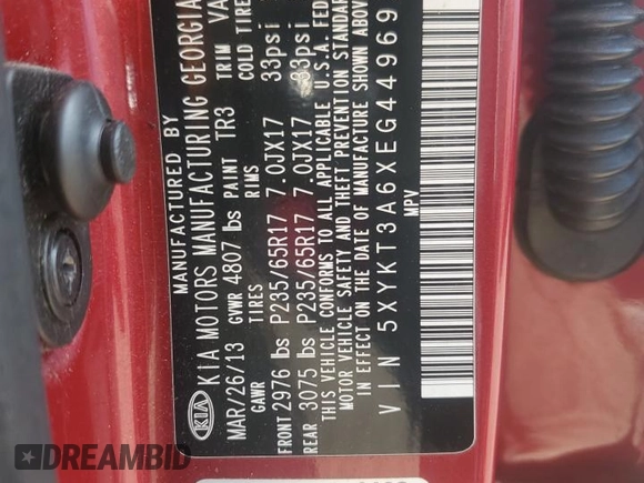 2014 Kia Sorento LX z VIN 5XYKT3A6XEG449692, wystawiony jako Copart lot #55324885 z przebiegiem 103 809 mil mil oraz Szkoda całkowita • Salvage title. Historia ofert i sprzedaży dostępna na DreamBid. Obrazek 13.
