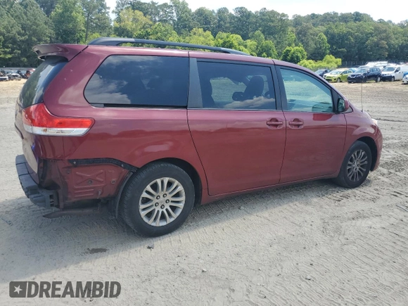 2012 Toyota Sienna XLE AAS z VIN 5TDYK3DC9CS243892, wystawiony jako Copart lot #61198555 z przebiegiem 129 061 mil mil oraz Nie do naprawy • Non repairable. Historia ofert i sprzedaży dostępna na DreamBid. Obrazek 3.