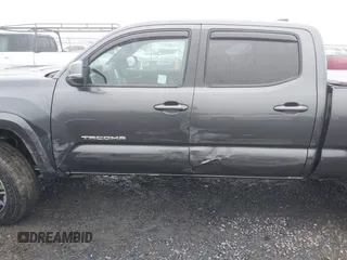 2021 Toyota Tacoma 4WD SR5 with VIN 3TMDZ5BN4MM099423, listed as a IAAI auction lot 41208397 with 62,935 mi miles. Bid and sale history available at carsss.com. Image 6.
