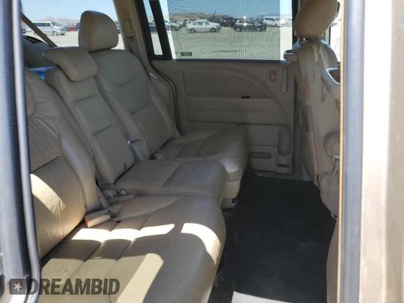 2005 Honda Odyssey EX-L with VIN 5FNRL38625B045152, listed as a Copart auction lot 57633005 with 145,776 mi miles and Salvage title. Bid and sale history available at DreamBid. Image 11.