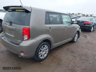 2011 Scion xB with VIN JTLZE4FE9B1141752, listed as a IAAI auction lot 41797088 with 114,357 mi miles. Bid and sale history available at carsss.com. Image 4.