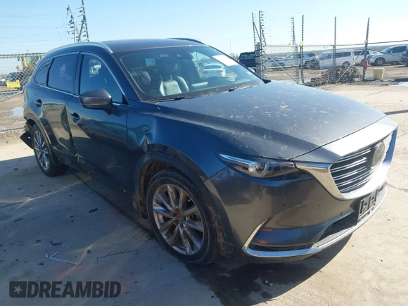 2019 Mazda CX-9 Grand Touring with VIN JM3TCADY8K0335429, listed as a IAAI auction lot 41203657 with 94,333 mi miles. Bid and sale history available at carsss.com. Image 1.