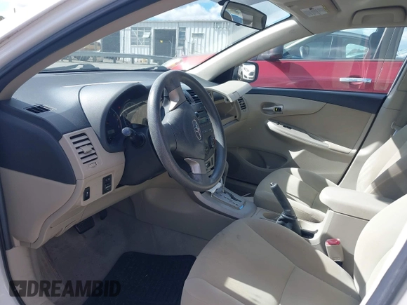 2011 Toyota Corolla L with VIN 2T1BU4EE6BC640408, listed as a IAAI auction lot 40565528 with 134,656 mi miles. Bid and sale history available at carsss.com. Image 5.