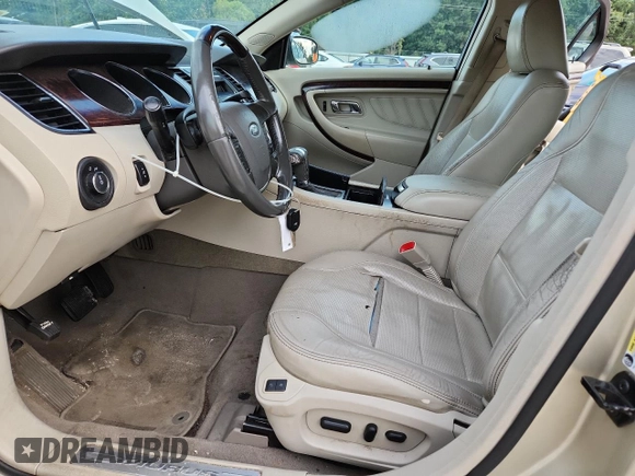 2010 Ford Taurus Limited with VIN 1FAHP2FW7AG138753, listed as a Copart auction lot 64880025 with 242,728 mi miles and Clean title. Bid and sale history available at DreamBid. Image 7.