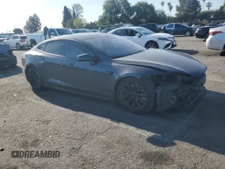 2017 Tesla Model S 100D с VIN 5YJSA1E23HF199497, выставлен на аукционе Copart как лот 51302475 с пробегом 61 993 миль миль и Списание • Salvage title. История ставок и продаж доступна на DreamBid. Изображение 4.