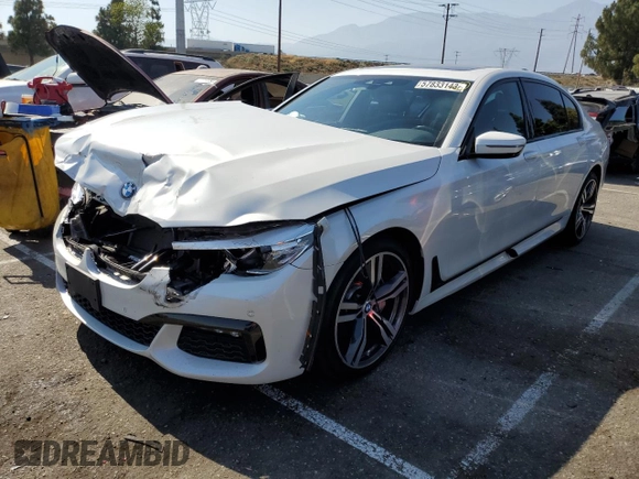 2018 BMW 7 Series 740i with VIN WBA7E2C5XJB214886, listed as a Copart auction lot 57833143 with 39,975 mi miles. Bid and sale history available at carsss.com. Image 1.
