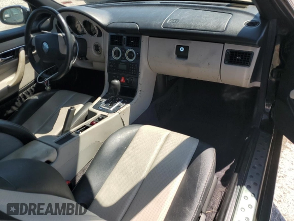 1999 Mercedes-Benz SLK-Class with VIN WDBKK47F5XF129037, listed as a Copart auction lot 68842504 with 74,397 mi miles and Salvage Title. Bid and sale history available at carsss.com. Image 8.