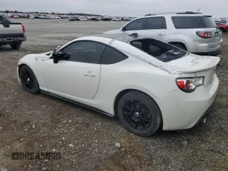 2015 Scion FR-S z VIN JF1ZNAA14F8703283, wystawiony jako Copart lot #50995885 z przebiegiem 101 033 mil mil oraz Szkoda całkowita • Salvage title. Historia ofert i sprzedaży dostępna na DreamBid. Obrazek 2.