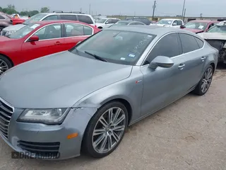 2013 Audi A7 Premium Plus with VIN WAUYGAFC1DN069906, listed as a IAAI auction lot 41906962 with 203,149 mi miles and . Bid and sale history available at DreamBid. Image 2.