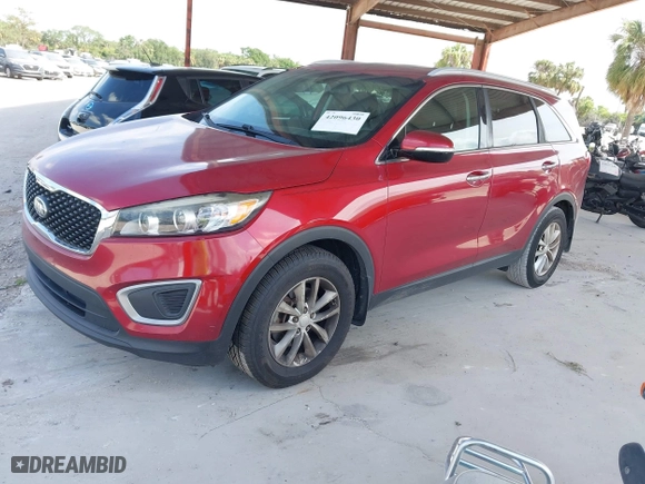 2016 Kia Sorento LX with VIN 5XYPG4A39GG090599, listed as a IAAI auction lot 42096430 with 126,595 mi miles. Bid and sale history available at carsss.com. Image 18.