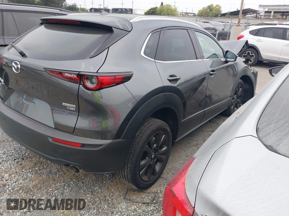 2024 Mazda CX-30 Premium Plus with VIN 3MVDMBEY1RM720111, listed as a IAAI auction lot 42730412 with 3,988 mi miles and . Bid and sale history available at DreamBid. Image 4.