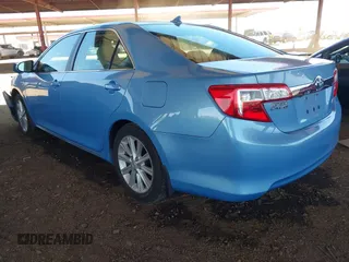 2012 Toyota Camry XLE z VIN 4T1BD1FK8CU003863, wystawiony jako IAAI lot #42336910 z przebiegiem 103 993 mil mil oraz . Historia ofert i sprzedaży dostępna na DreamBid. Obrazek 3.