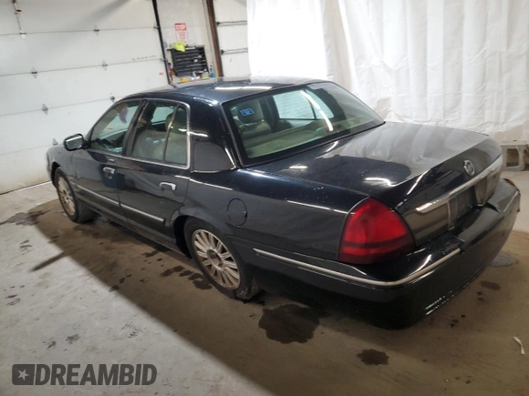 2010 Mercury Grand Marquis LS z VIN 2MEBM7FV6AX628705, wystawiony jako Copart lot #52185105 z przebiegiem 139 485 mil mil oraz Szkody całkowita. Historia ofert i sprzedaży dostępna na DreamBid. Obrazek 2.