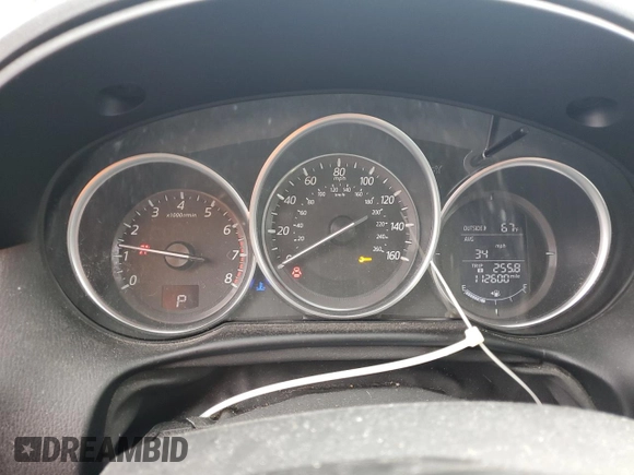 2016 Mazda CX-5 Sport z VIN JM3KE4BY2G0802376, wystawiony jako Copart lot #55976585 z przebiegiem 112 600 mil mil oraz Szkoda całkowita • Salvage title. Historia ofert i sprzedaży dostępna na DreamBid. Obrazek 9.