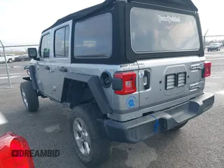 2020 Jeep Wrangler Unlimited Sport S with VIN 1C4HJXDG4LW221778, listed as a IAAI auction lot 41441662 with 76,026 mi miles and . Bid and sale history available at DreamBid. Image 3.