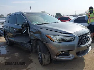 2020 Infiniti QX60 Luxe with VIN 5N1DL0MN2LC527549, listed as a IAAI auction lot 42408763 with 56,371 mi miles and . Bid and sale history available at DreamBid. Image 1.
