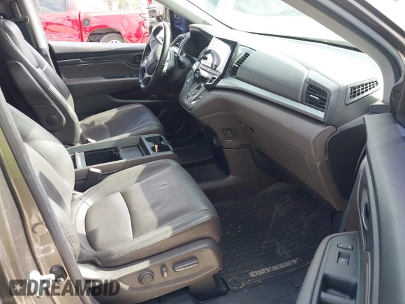 2022 Honda Odyssey EX-L with VIN 5FNRL6H77NB031502, listed as a IAAI auction lot 41706098 with 57,074 mi miles and . Bid and sale history available at DreamBid. Image 5.