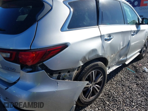 2019 Infiniti QX60 LUXE with VIN 5N1DL0MN3KC555343, listed as a IAAI auction lot 41331200 with 103,085 mi miles. Bid and sale history available at carsss.com. Image 6.