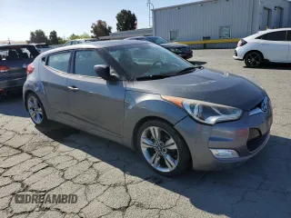 2012 Hyundai Veloster w/Gray Int z VIN KMHTC6AD9CU079542, wystawiony jako Copart lot #55998045 z przebiegiem 98 065 mil mil oraz Szkoda całkowita • Salvage title. Historia ofert i sprzedaży dostępna na DreamBid. Obrazek 4.