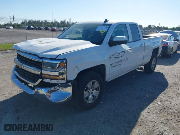 2018 Chevrolet Silverado 1500 LT with VIN 1GCRCREC1JZ153165, listed as a IAAI auction lot 41737258 with 130,475 mi miles and . Bid and sale history available at DreamBid. Image 18.