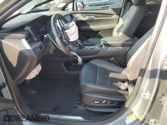 2023 Cadillac XT5 AWD Premium Luxury with VIN 1GYKNDR40PZ152982, listed as a Copart auction lot 69569914 with 24,829 mi miles and Salvage Title. Bid and sale history available at DreamBid. Image 7.